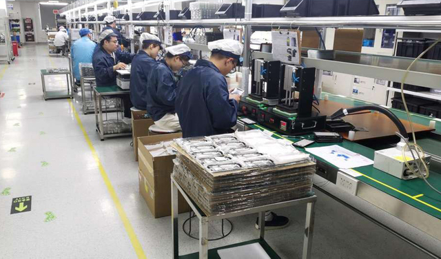 Production area at Barway Barcode where POS terminals are being assembled and tested.