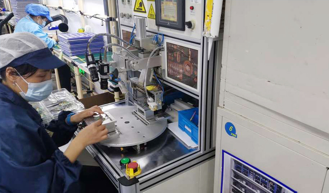 Quality control station in the Barway Barcode production facility, ensuring high standards for all products.